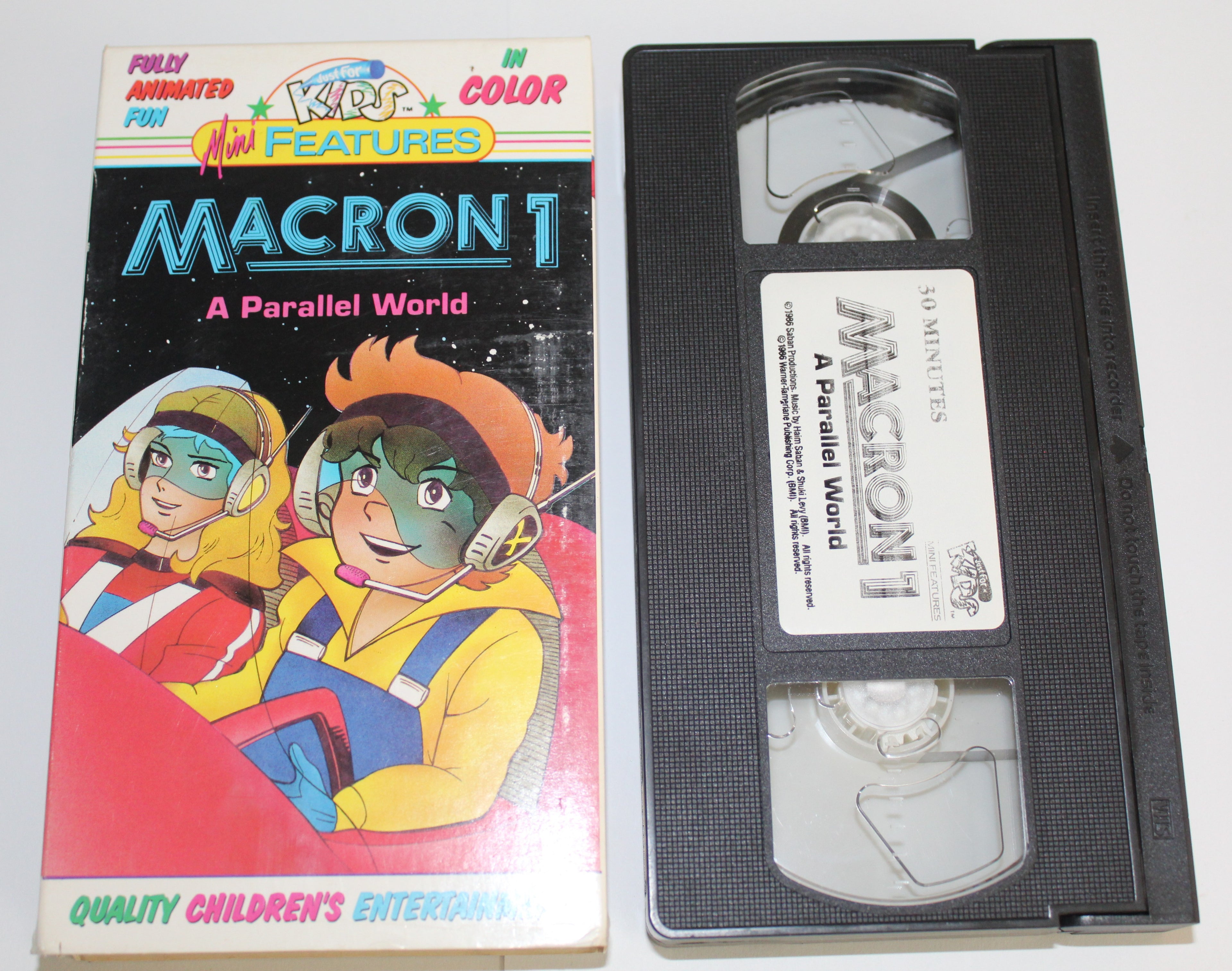 Macron 1 VHS Tape A Parallel World 1986 Warner Saban